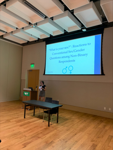 Undergraduate Sociology major, McKensi Bryce, presenting her work at UNT Scholar's Day